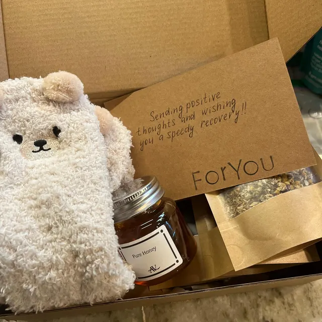 Photo shared by Etsy buyer in an Etsy review of Hygge Gift Box: Cute Socks, Tea & Honey